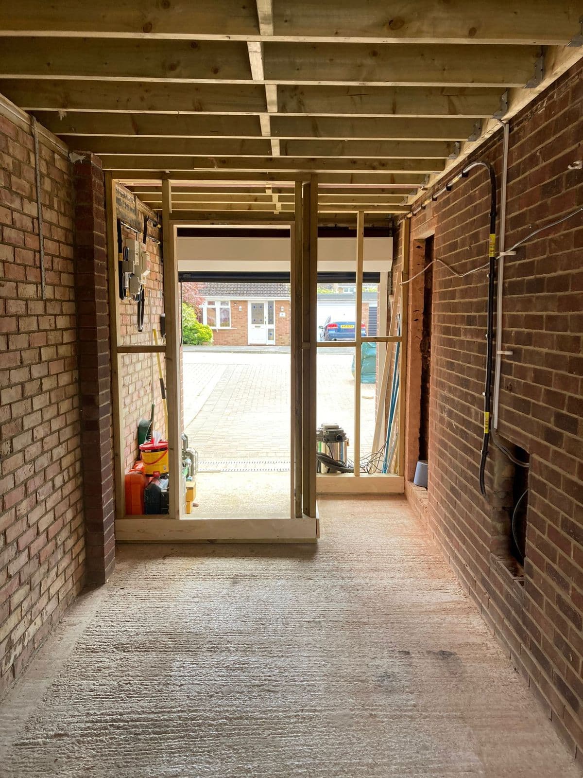 Garage conversion under way with new stud walls and ceiling joists